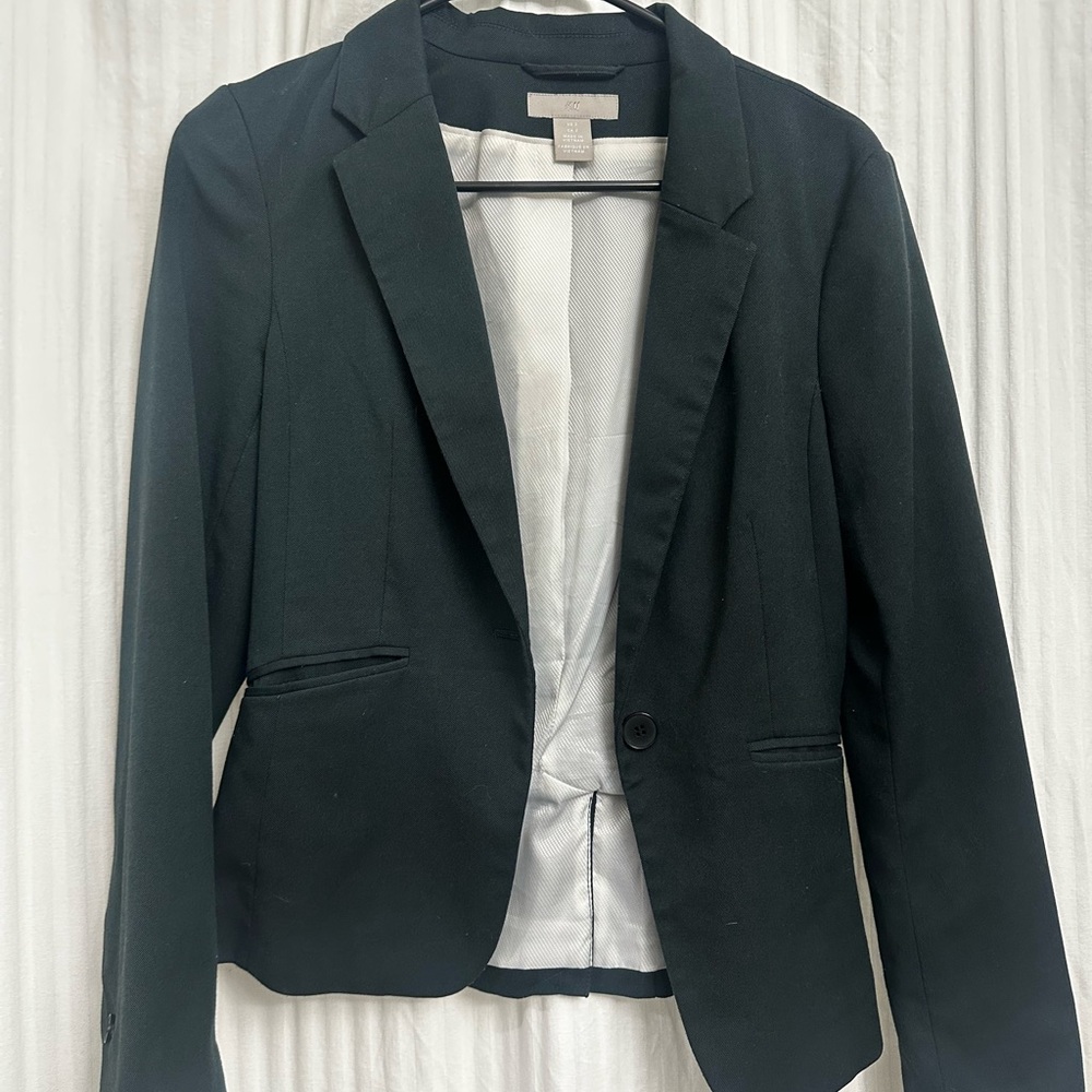 Dark green blazer suit jacket